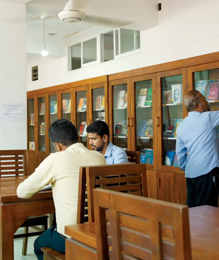 Readers in a library